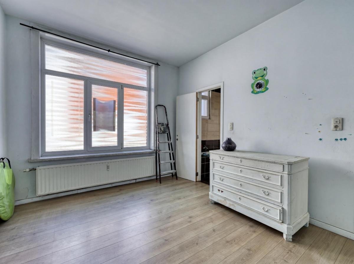 photo 24 du bien APPARTEMENT 2 CHAMBRES, CAVE ET PETIT JARDIN