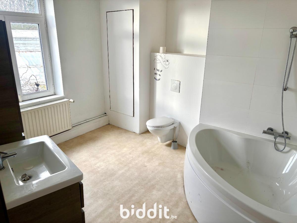 photo 8 du bien Maison 3 façades dans le centre de Marche-en-Famenne 