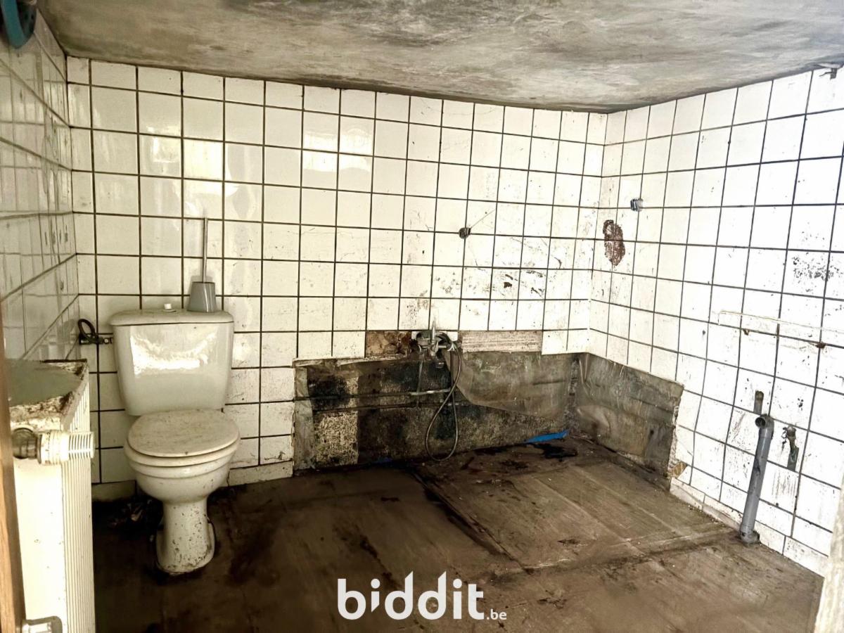 photo 13 du bien Maison 3 façades dans le centre de Marche-en-Famenne 