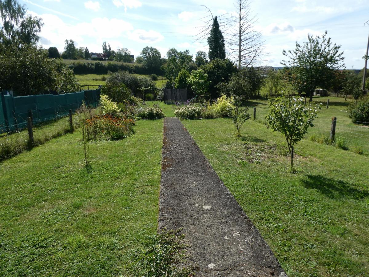 photo 17 du bien A VENDRE: Maison 3 façades rénovée avec garage et jardin