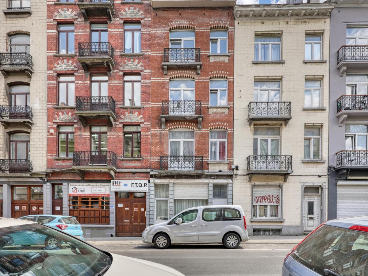 photo 2 du bien Une maison de rapport à 3 étages + combles mansardés