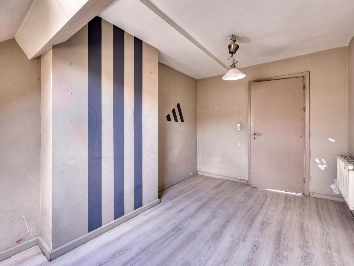 photo 6 du bien Une maison de rapport à 3 étages + combles mansardés