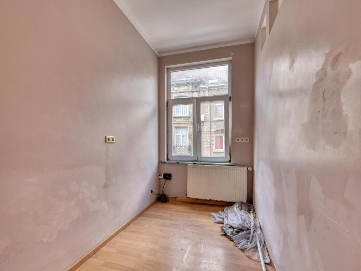 photo 15 du bien Une maison de rapport à 3 étages + combles mansardés