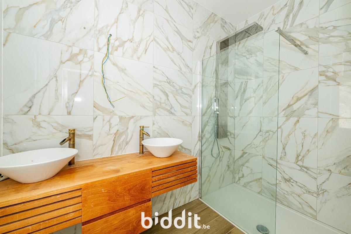 photo 15 du bien Une maison de rapport à 1 étage avec partie de jardin