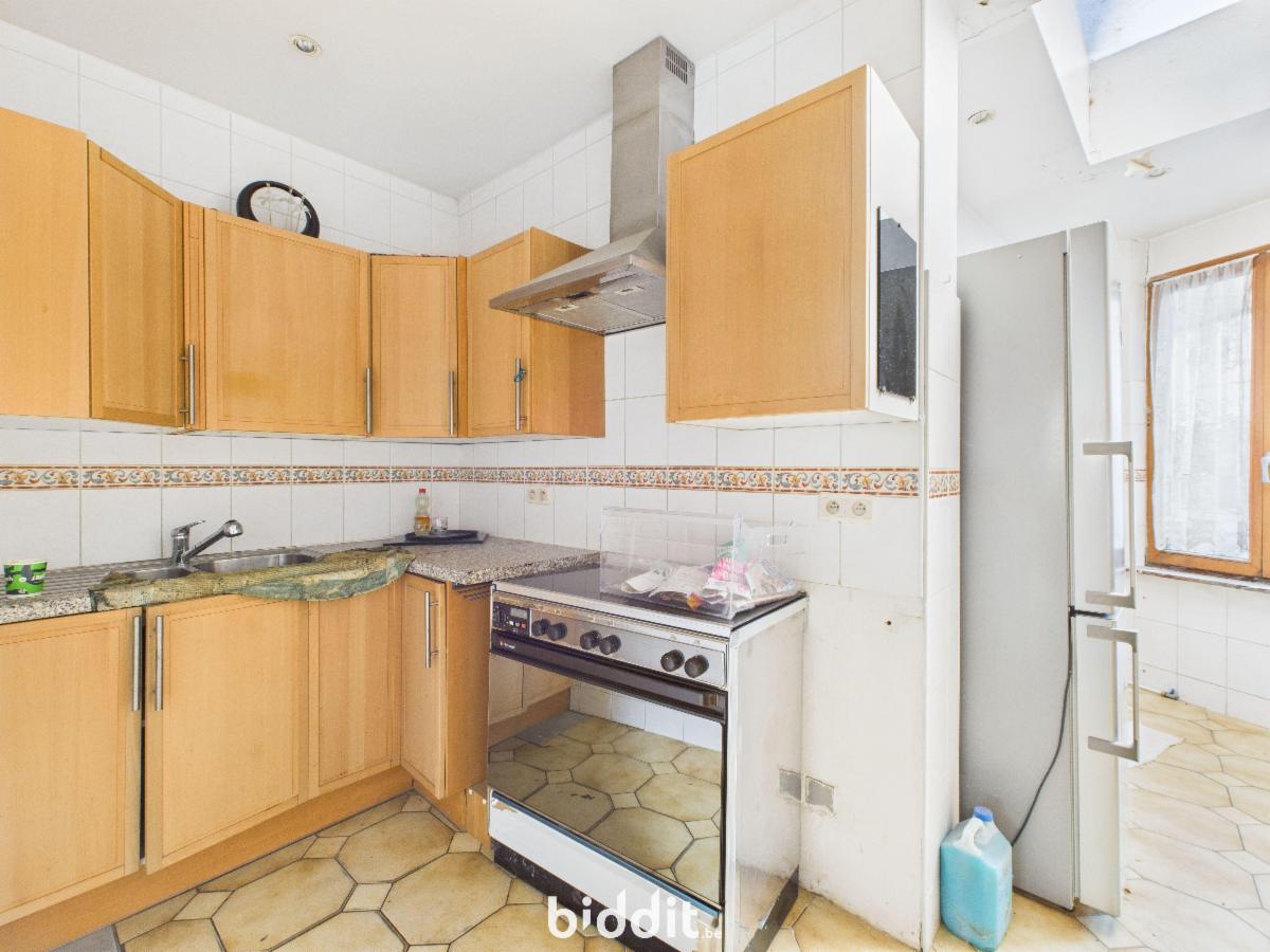 photo 4 du bien Une maison avec garage