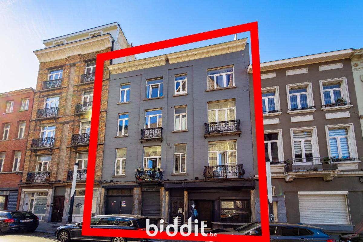 photo 2 du bien Une propriété comprenant 2 maisons de commerce et de rapport