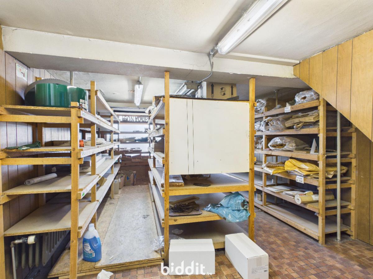 photo 11 du bien Une maison de commerce