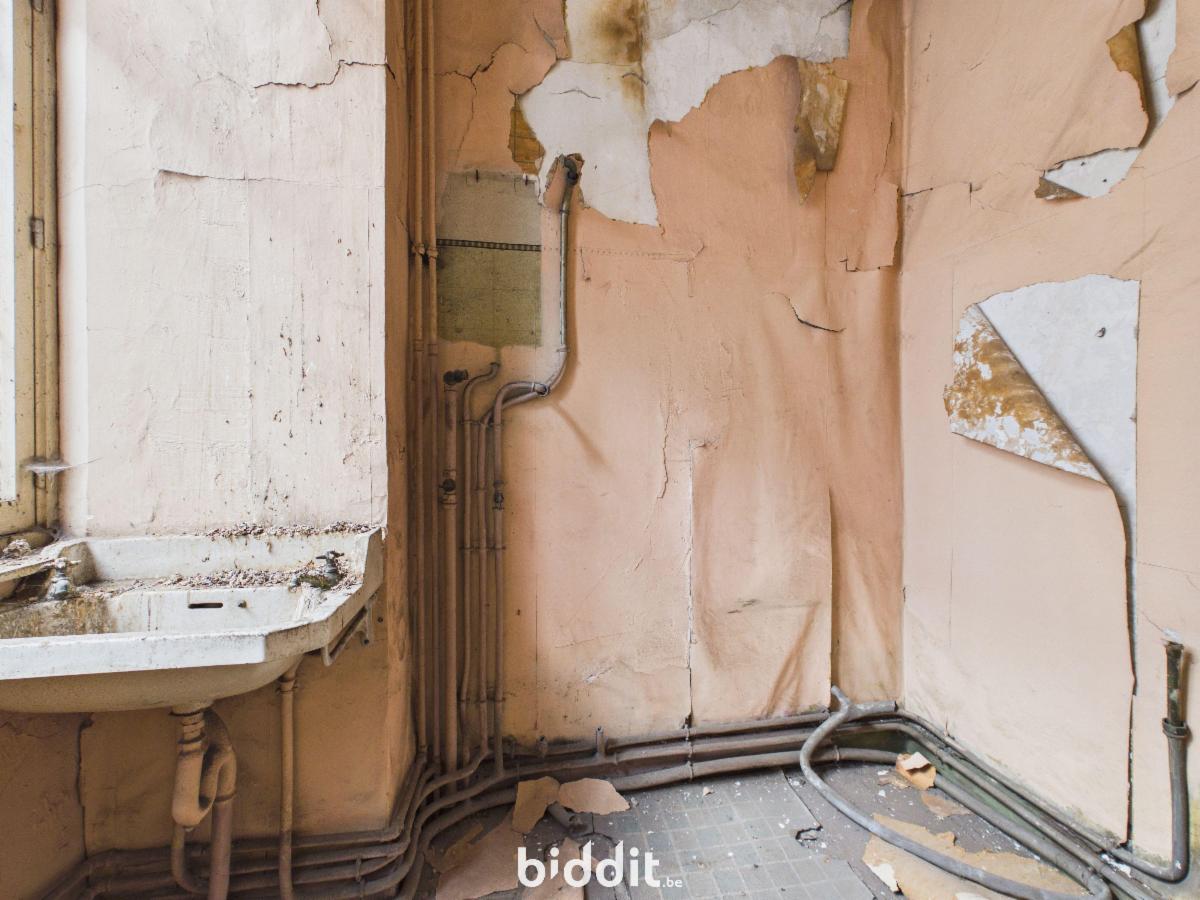 photo 16 du bien Une maison de commerce