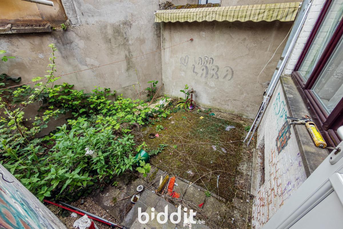 photo 14 du bien Une maison avec dépendances et garage