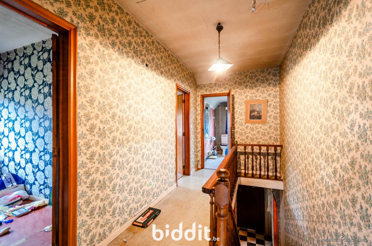 photo 11 du bien Une maison d’habitation à rénover avec rez-de-jardin