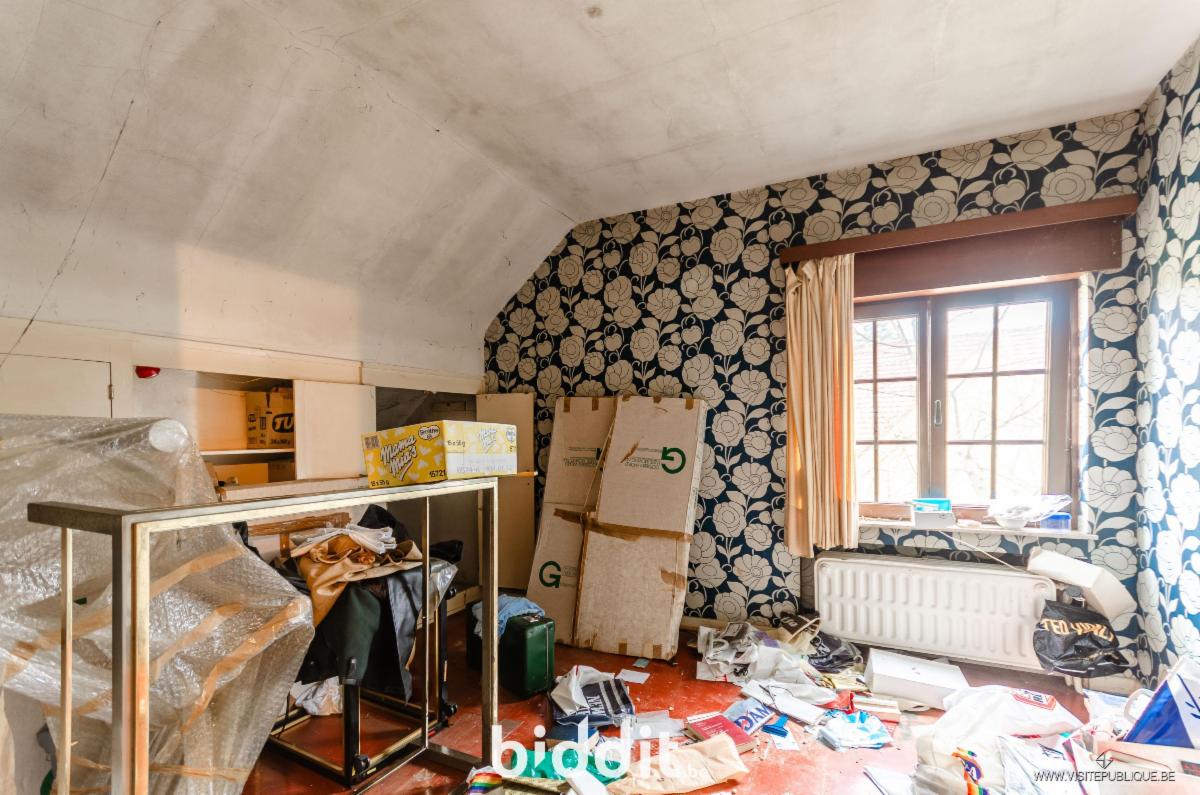 photo 13 du bien Une maison d’habitation à rénover avec rez-de-jardin