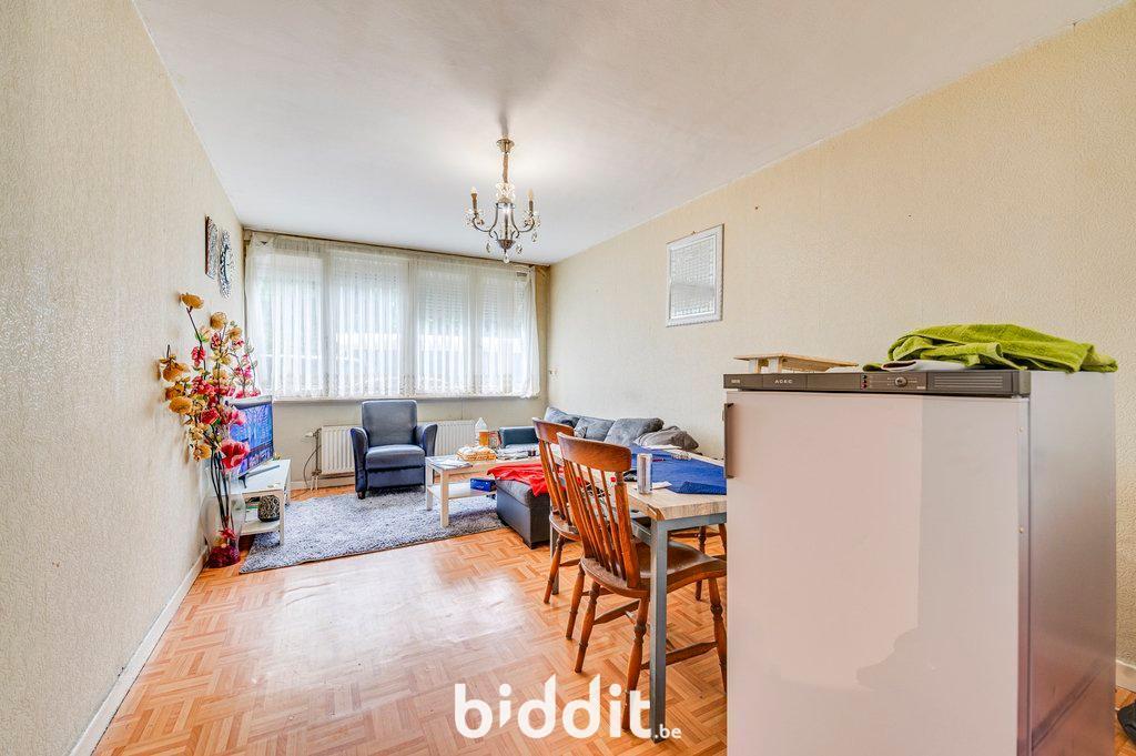 photo 4 du bien Lot 1 : Appartement rdc et 2 caves + garage au rdc. (lot 2)