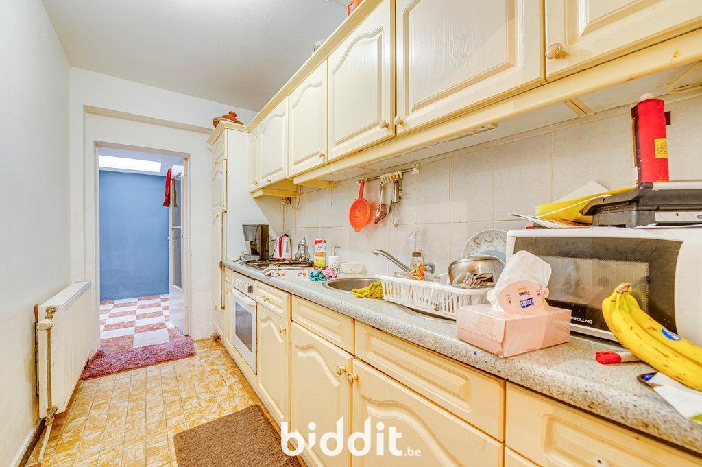 photo 5 du bien Lot 1 : Appartement rdc et 2 caves + garage au rdc. (lot 2)