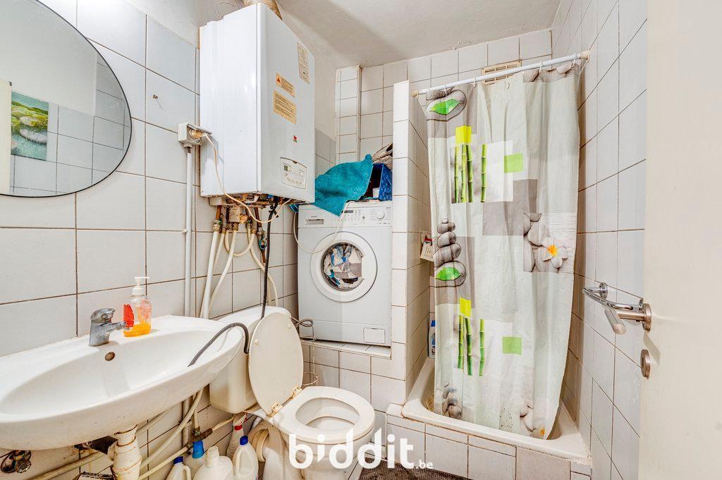 photo 8 du bien Lot 1 : Appartement rdc et 2 caves + garage au rdc. (lot 2)