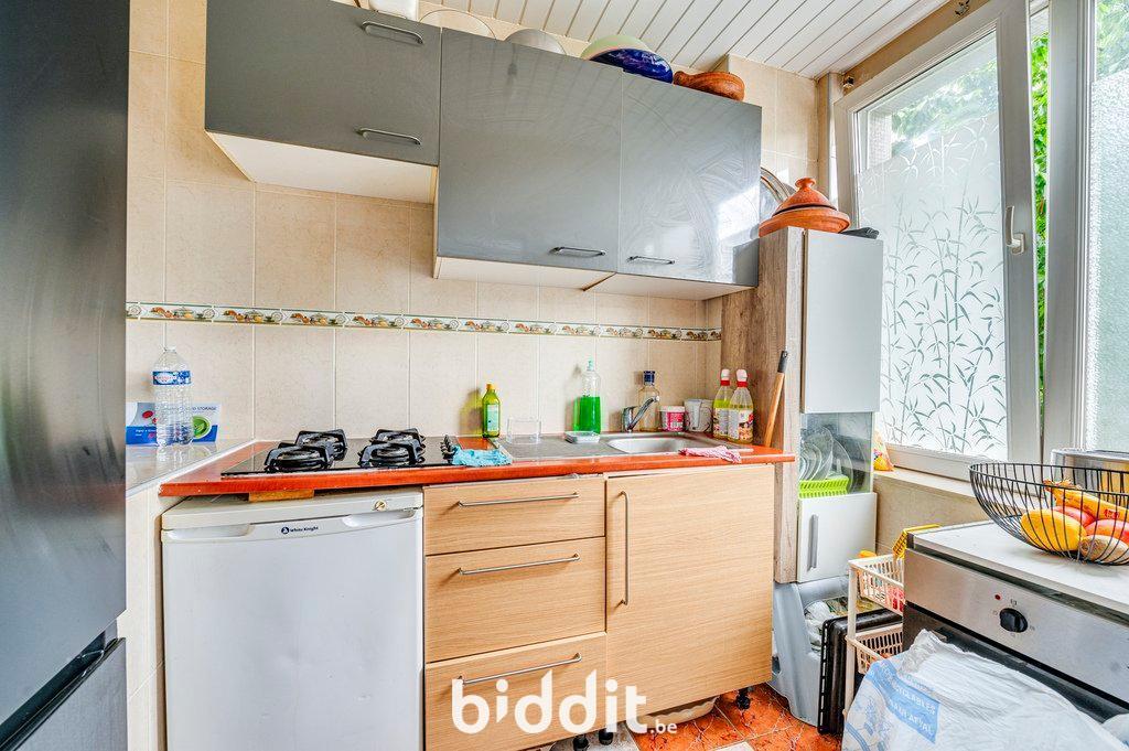 photo 5 du bien Lot 3 : Appartement au 1e ét., 3 caves + garage au rdc(lot2)