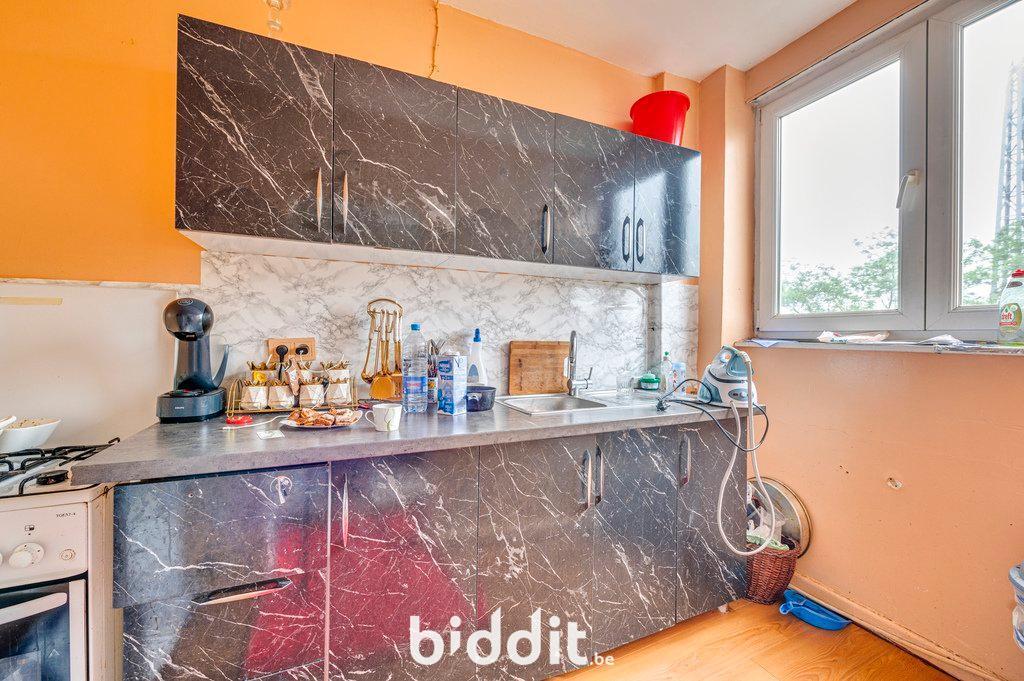 photo 5 du bien Lot 6 : Appartement au 4e ét., 2 caves +garage au rdc(lot 2)