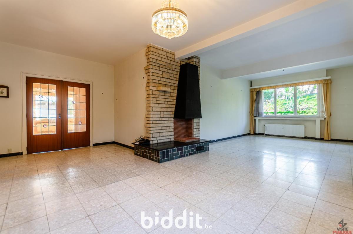 photo 4 du bien Local à usage de bureaux + appartement + garage 