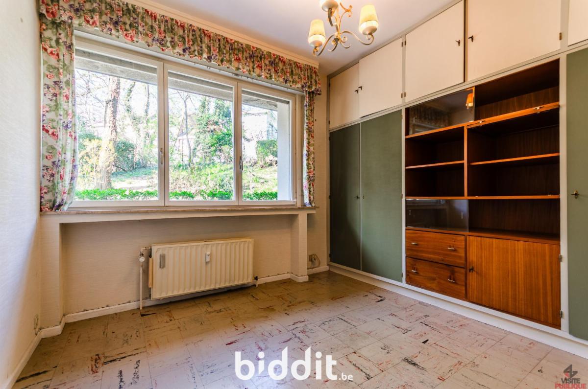 photo 5 du bien Local à usage de bureaux + appartement + garage 